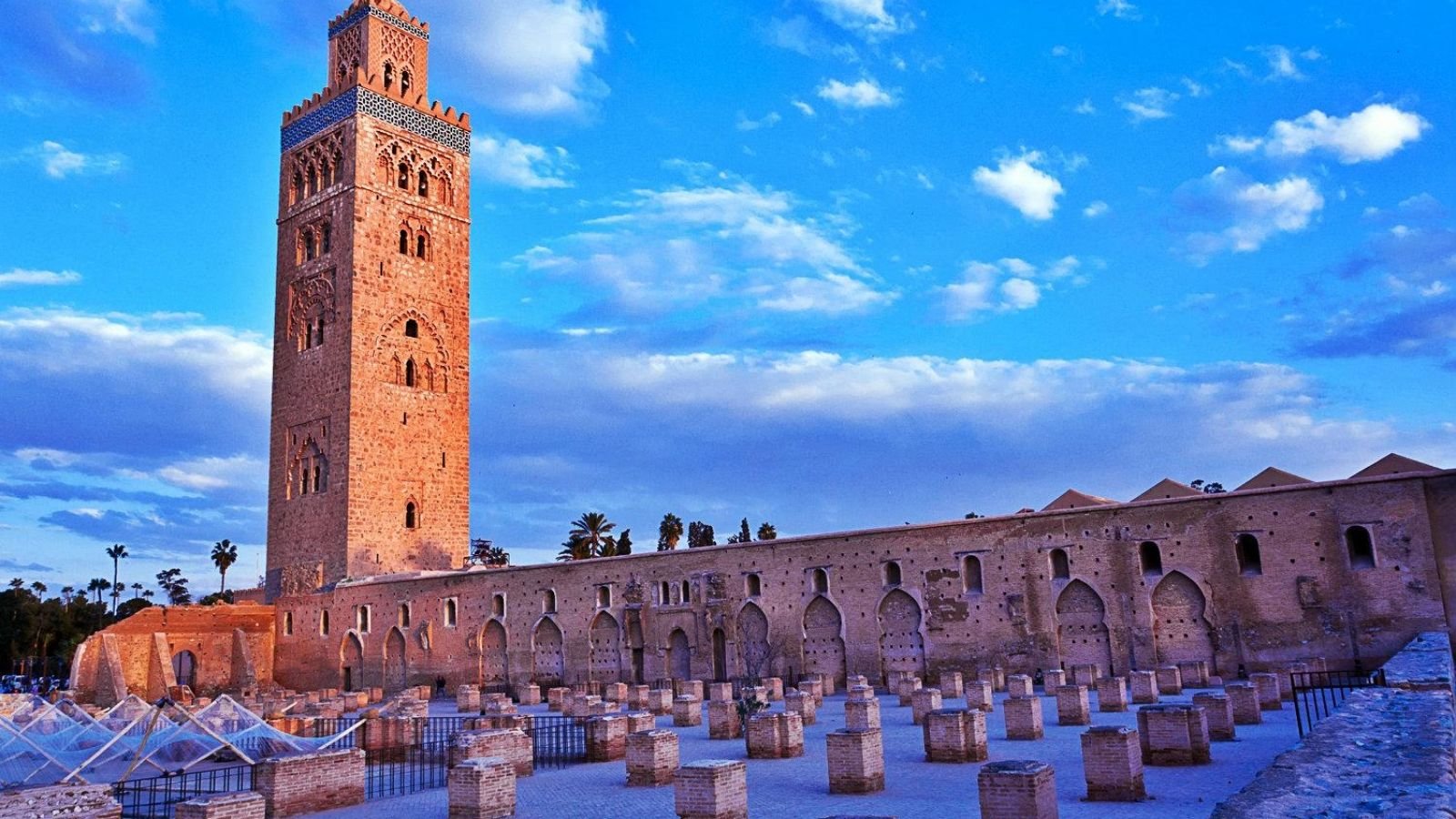The Koutoubia Mosque stands tall with its majestic minaret, surrounded by tranquil gardens in Marrakech