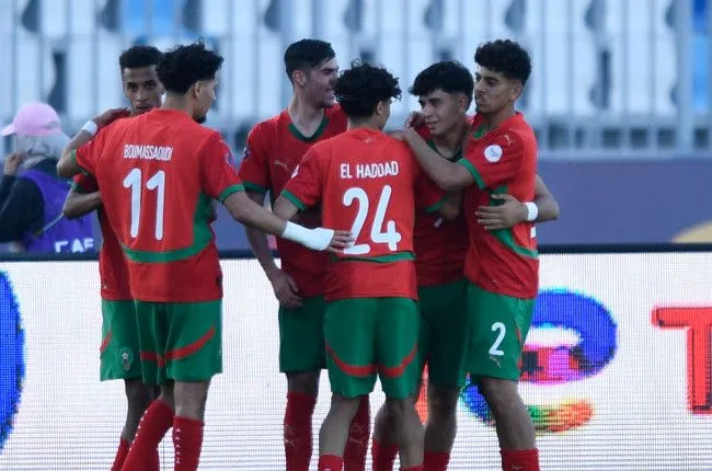 Morocco U-20 football team huddled together before the final match