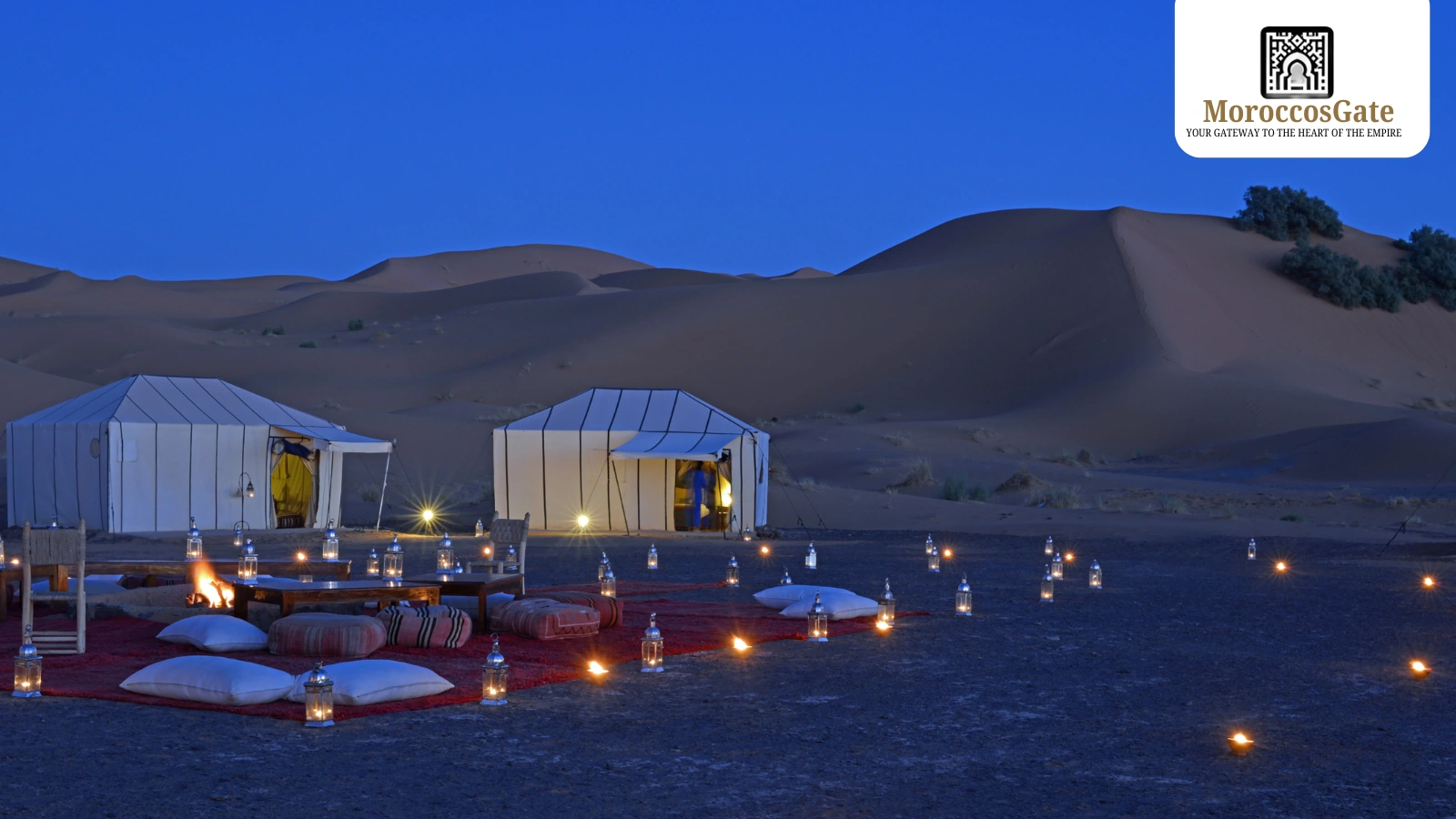 Luxurious Berber-style tents under a vast desert sky